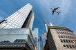 © Prasit Rodphan - Frankfurt skyscrapers buildings and a plane flying overhead