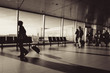 © Kritchanon - Blur of  Siluate people visit departure hall in airport.