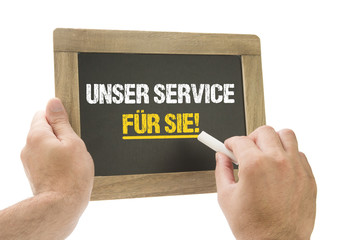 Canvas Print - Unser Service für Sie! / Hand schreibt auf Tafel