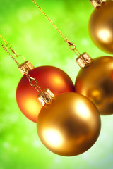 Sticker - Christmas baubles on green background