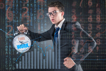Wall Mural - Young businessman in business time concept 