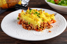 Traditional British Shepard Pie On Plate With Salad