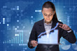 © Elnur - Businesswoman in stock trading business concept