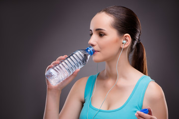 Sticker - Woman doing sports with bottle of fresh water