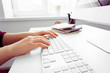 © fotofabrika - Hands of an office woman typing