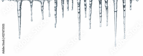 Fotomural Close up of icicles isolated on white background