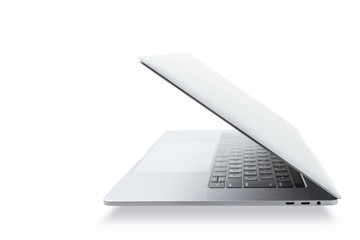 silver laptop PC side view on white background