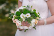 bride holding a beautiful bridal bouquet