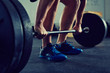 © baranq - Closeup of muscular man doing deadlift exercise at gym - fitness, healthy lifestyle concept