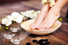 Closeup Photo Of A Female Feet At Spa Salon On Pedicure Procedur
