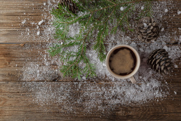 Hot Coffee cup on a frosty winter day window background /Christm