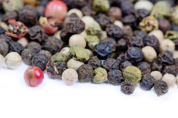 Poster - Mix peppercorns on white background