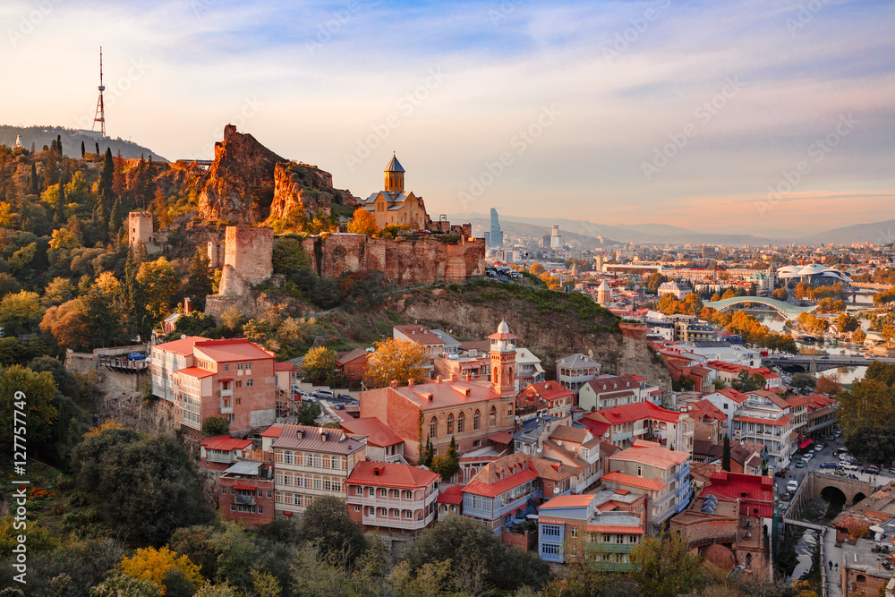 Beautiful sunset view of Old Tbilisi from the hill - obrazy, fototapety, plakaty 