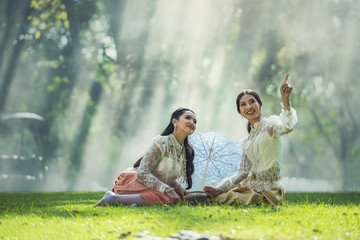 Wall Mural - Thai woman wearing typical Thailand traditional dress, identity culture of Thailand