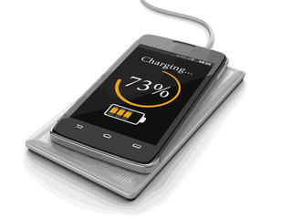 Poster - Wireless charging of smartphone. Image with clipping path.