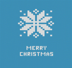 Knitted blue Merry Christmas greeting card with knitted snowflake