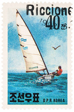 Sailing Yacht In The Sea On Postage Stamp