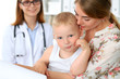 © rogerphoto - Little boy child  with his mother  after health exam at doctor's office