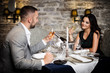 © Maksim Toome - Couple celebrating in restaurant