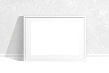 Blank photo frame mock up near the wall with new modern wallpaper