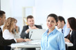 © Africa Studio - Businesswoman with colleagues on background at office