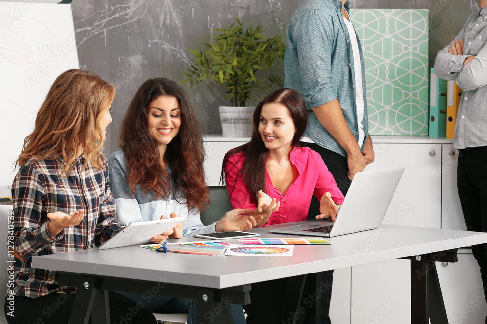 Group of designers working at office
