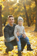 © Africa Studio - Father and son in beautiful autumn park