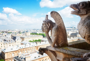 Canvas Print - Gargoyle of Paris on Notre Dame Cathedral church and Paris cityscape from above, France, retro toned