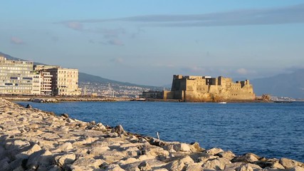 Wall Mural - Naples panoramic view of Castel dell Ovo at sunset in the bay of Naples italy