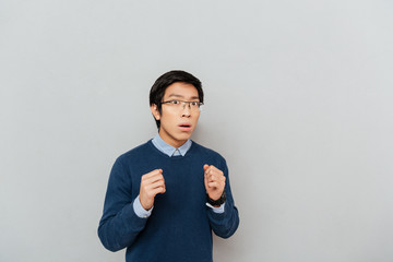 Poster - Close up portrait of surprised asian man