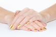 © Dmitry Zimin - Golden manicure fingers closeup
