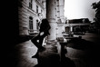 © IVASHstudio - young and handsome groom in black suit standing near manor