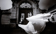 © IVASHstudio - young and beautiful bride and groom standing together outdoors