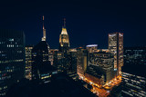 Fototapeta Nowy Jork - View of buildings in downtown at night, in Baltimore, Maryland.