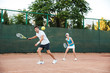 © Drobot Dean - Handsome couple playing in tennis
