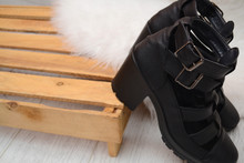 Fashion Concept, Black Female Shoes With Buckles On The Wooden Box, Space For Text