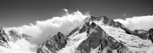Black And White Mountain Panorama In Clouds