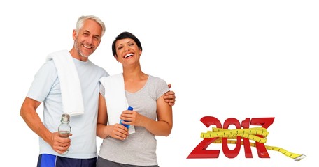 Poster - Composite image of portrait of a happy fit couple