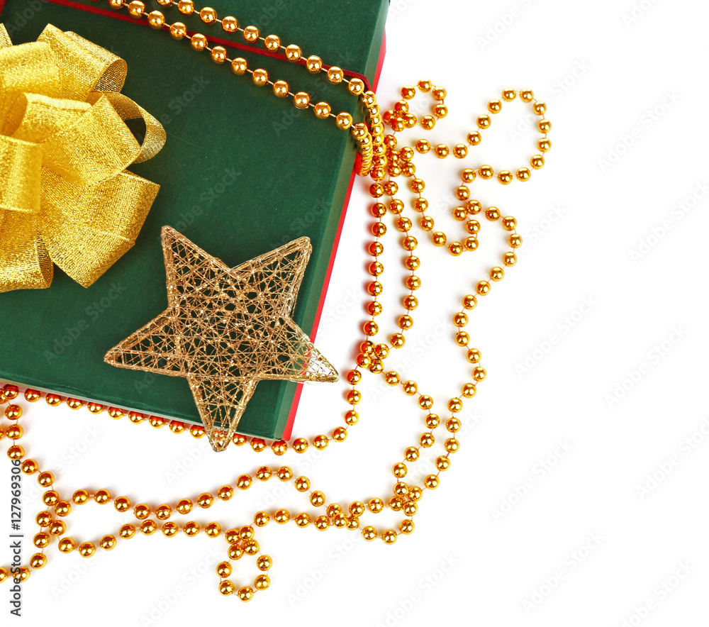 Christmas present with decorations on white background