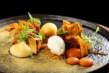 Fine dining dessert, Carrot cake,caramel ice cream, white chocolate mousse and spices