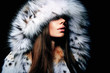 © EkaterinaJurkova - Luxury girl with long brown hair in a fur coat. The Snow Queen. Cold girl.