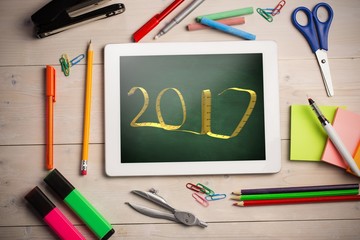 Poster - Composite image of digital image of new year written with tape m