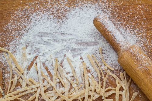 Fotografie, Obraz making homemade noodles. Flour and rolling pin