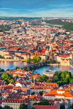 Panorama Of The Old Part Of Prague From The Petrin Tower. Beautiful View On The Bridges Over The River Vltava At Sunset. Old Town Architecture, Czech Republic.