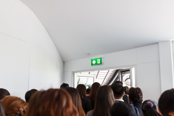 people escape to fire exit door