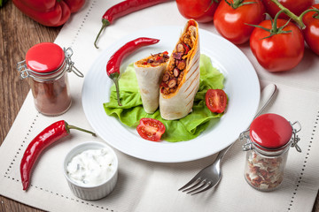 Canvas Print - Burritos filled wiht minced meat, bean and vegetables.