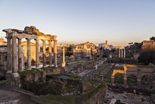 Sunset Light On The Roman Forum, The Colosseum In The Background, Rome, Italy