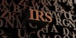 Irs - Wooden 3D rendered letters/message.  Can be used for an online banner ad or a print postcard.