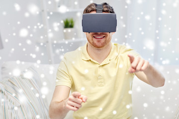 Wall Mural - young man in virtual reality headset or 3d glasses