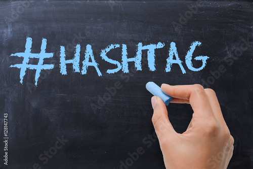 Social media hashtag on blackboard with chalk